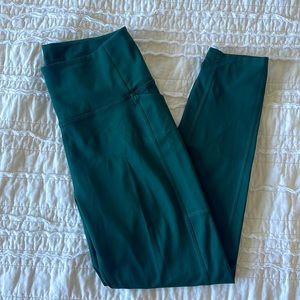 Girlfriend Collective compressive pocket legging in Moss size M.